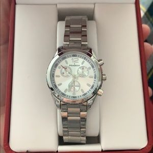 Brand new Silver Peugeot watch